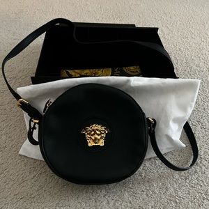 Versace round camera bag.